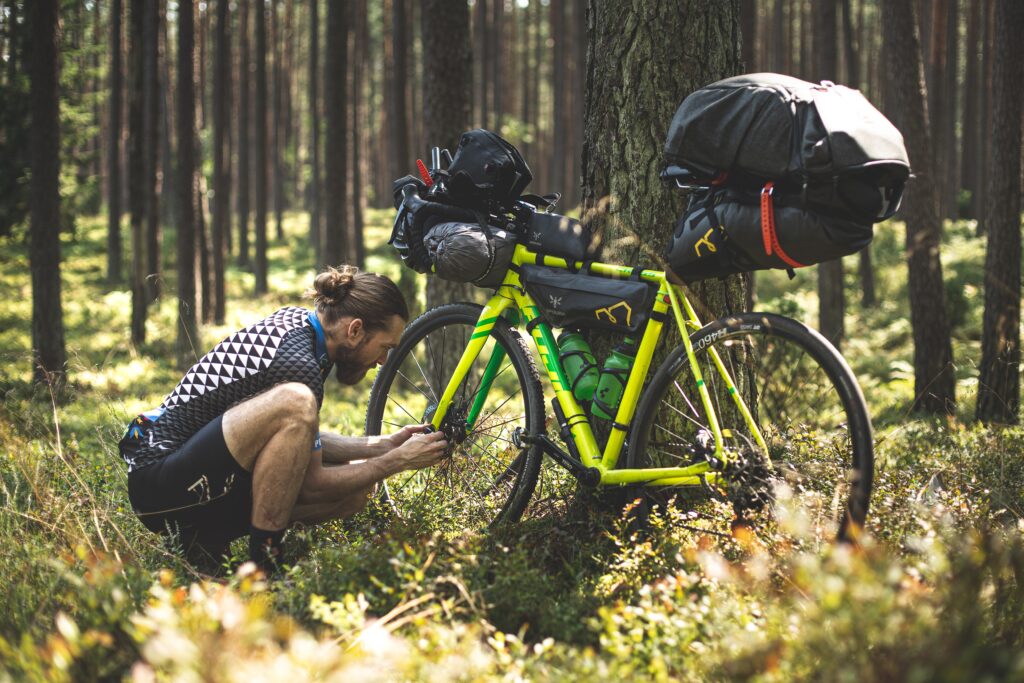 Best equipped for a long bikepacking tour (Photo by Marek Piwnicki on Unsplash)