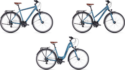 Three Cube Touring One bikes side by side: one with a diamond frame, one with a trapezoidal frame, and one with a low step-through frame.